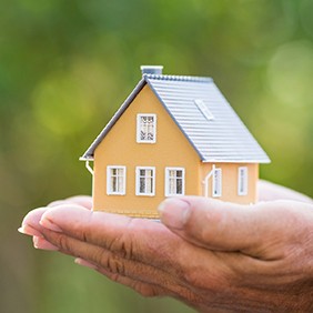 Ecology house in hands