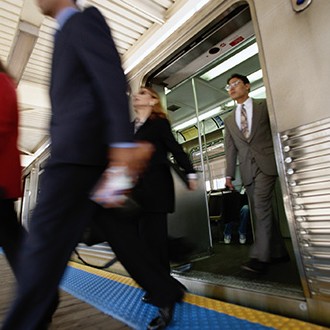 Businesspeople Exiting Train