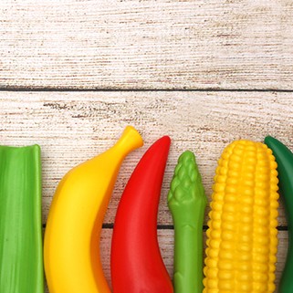 Fake Fruits and Vegetables on a Wooden Table